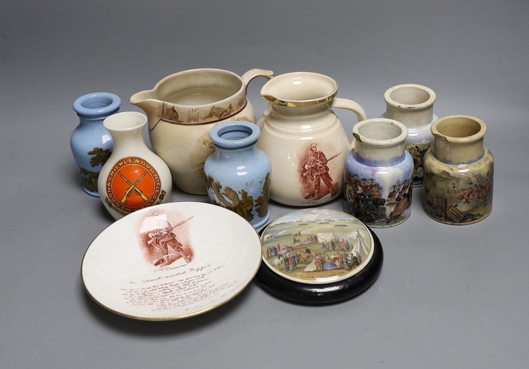 Crimean, Boer war, WWI and shooting commemorative ceramics - including Pratt ware pots, a gentleman in khaki jug and saucer, a rifle contest Wimbledon 1865 pot lid, a Goss Hendon and Cricklewood rifle club vase etc.